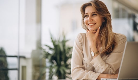 portrait-business-woman-working-laptop-min